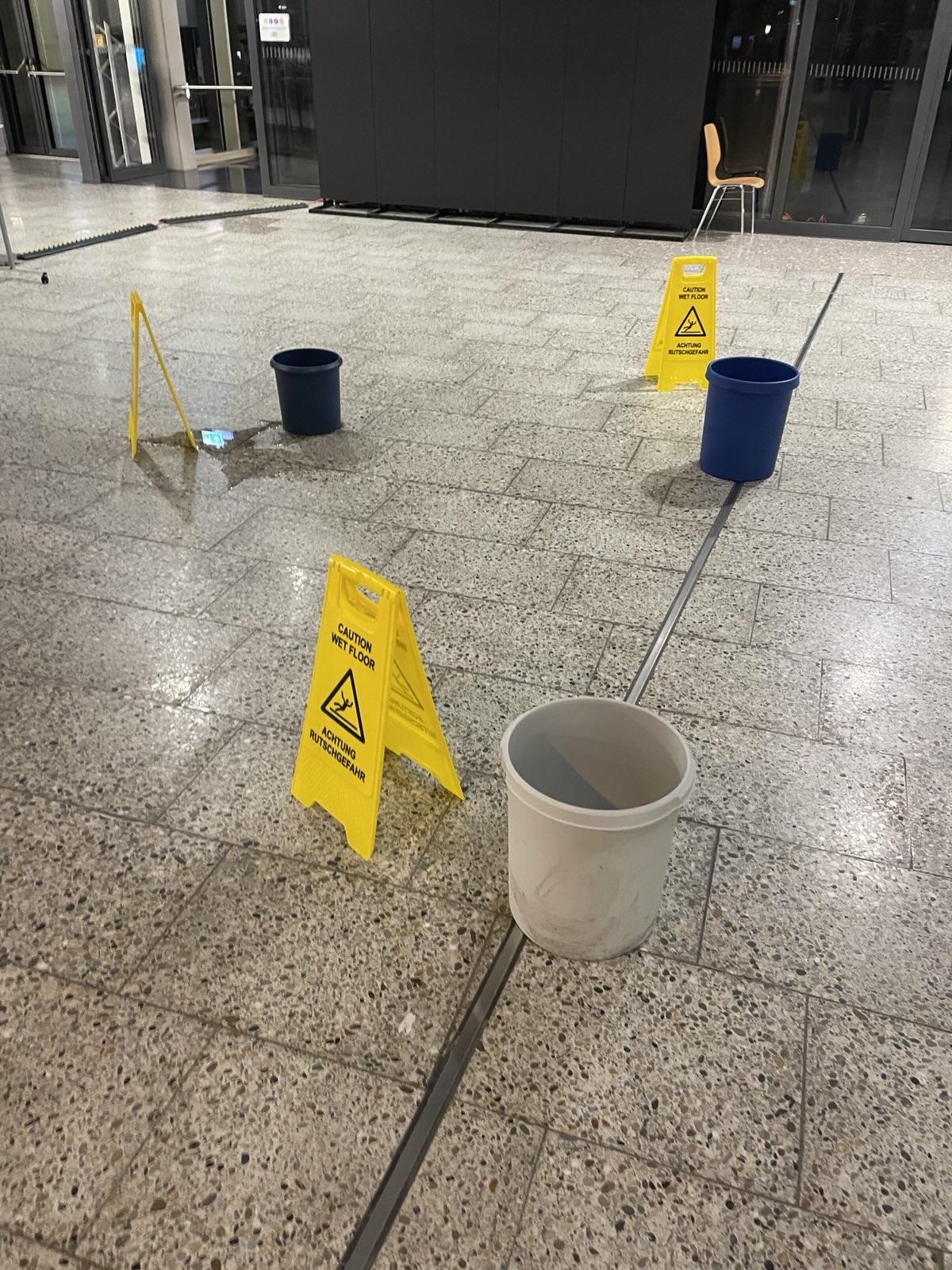 Buckets to collect water from the ceiling